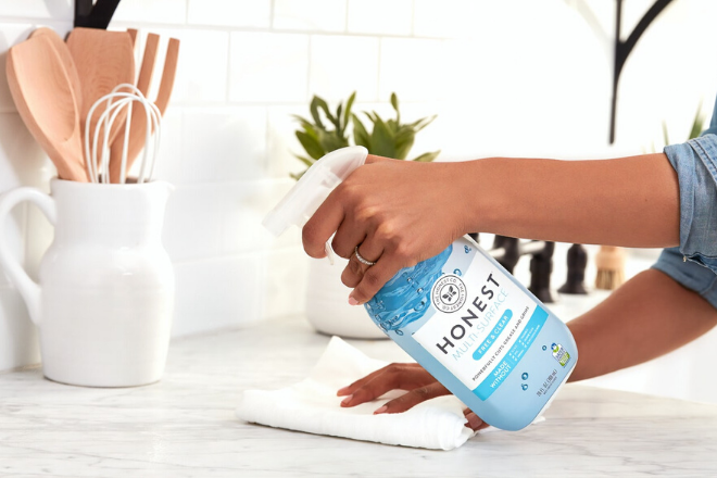 Cleaner using cleaning spray marked 