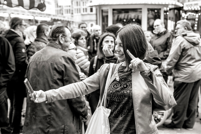 Woman taking a selfie by Johann Ebend